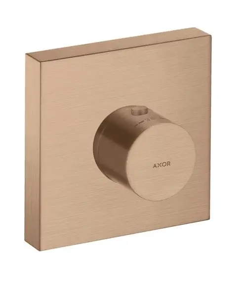 Thermostatmodul mit runder Bedienknopf in gebürstetem Rotgold, montiert auf quadratischer Grundplatte, Marke AXOR.